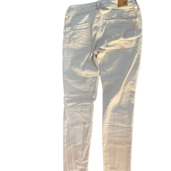 ❣️5/$50 American Eagle Super Stretch Distressed Pink Skinny Jeans size 00 short. - Picture 2 of 3